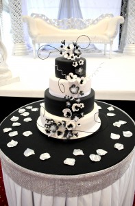 4 tiered black and white themed flower wedding cake