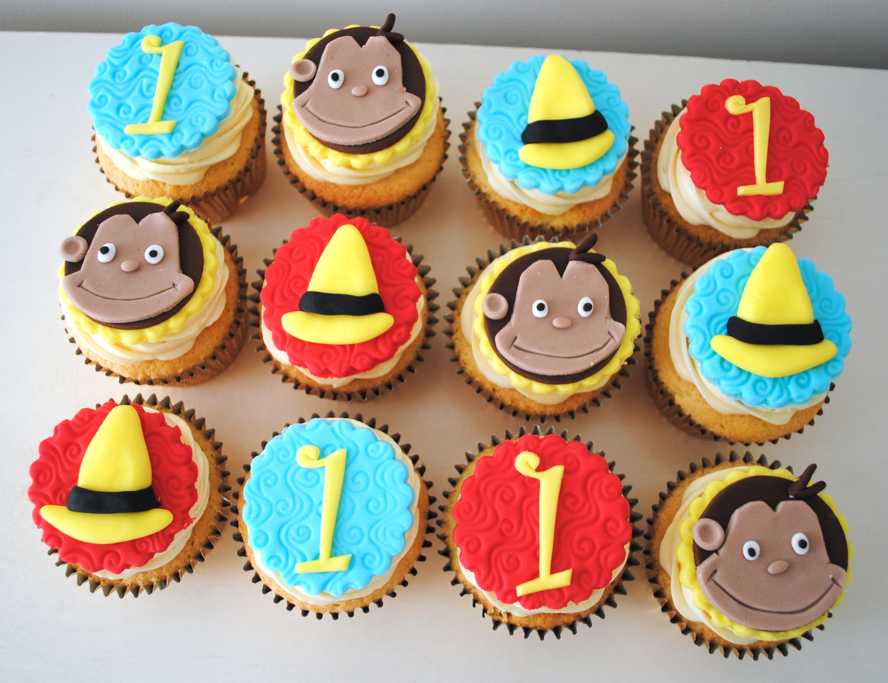 Curious George first birthday cupcakes