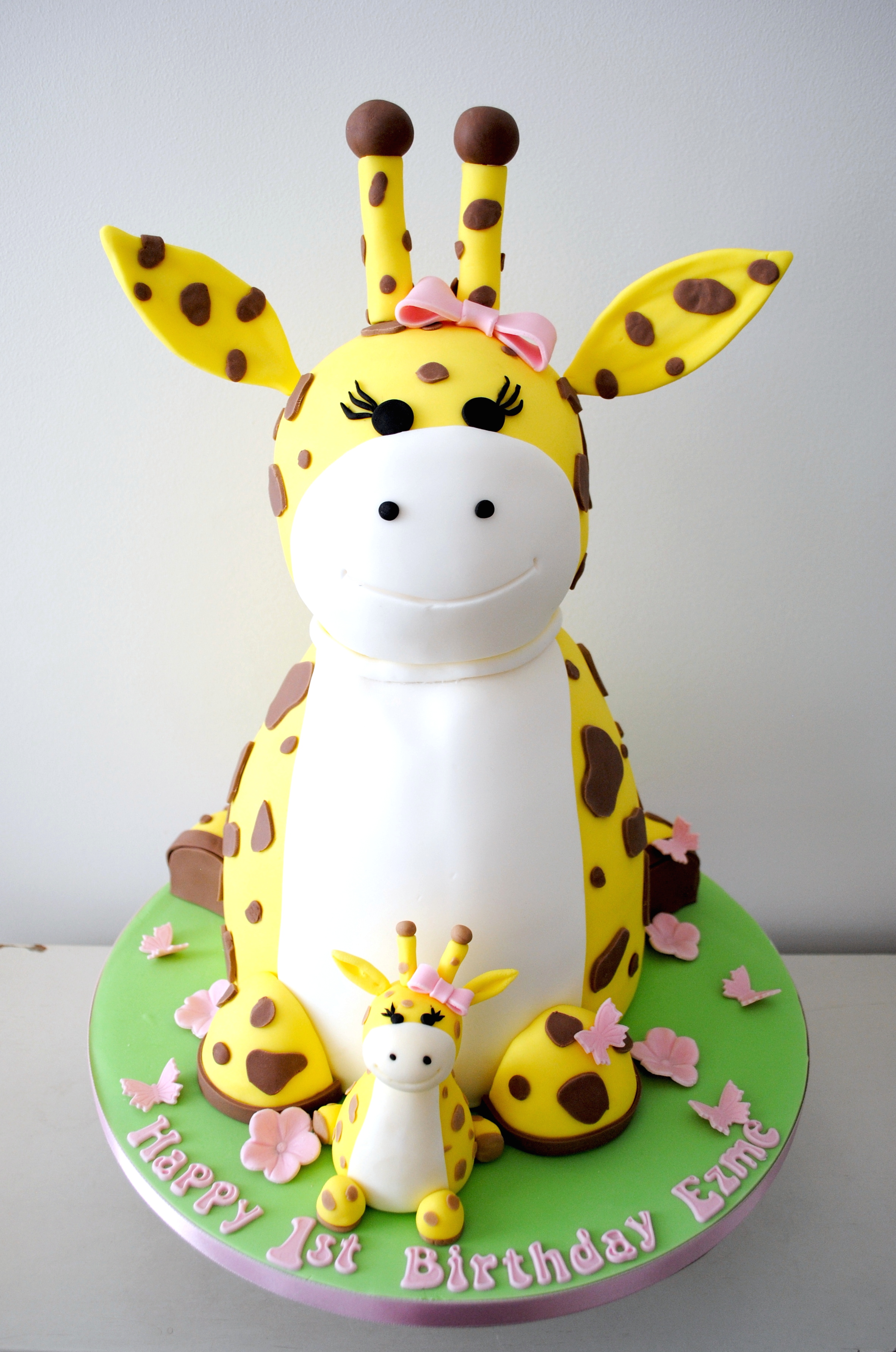 Mummy and baby giraffe birthday novelty cake