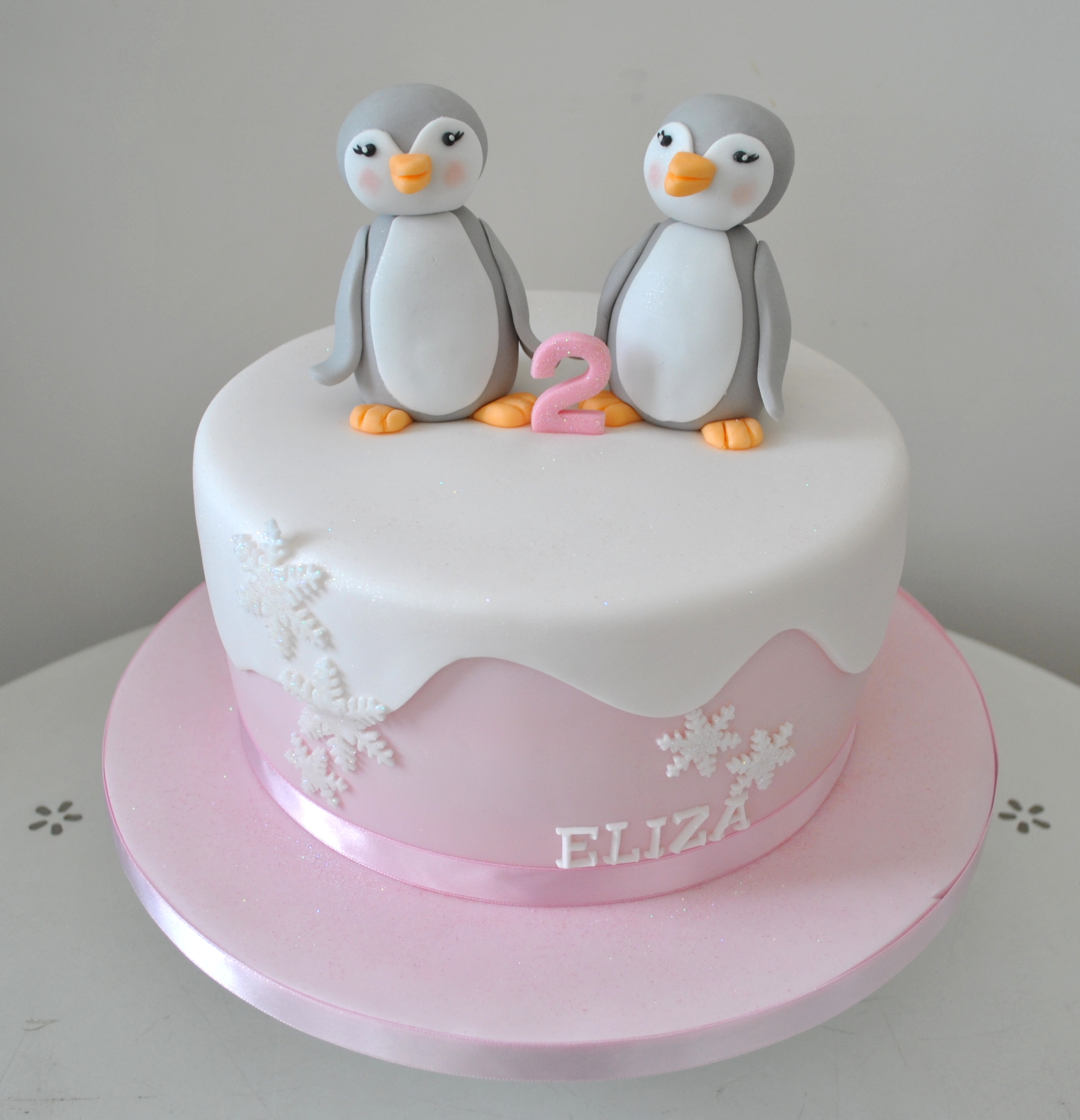 Penguin twin birthday cake