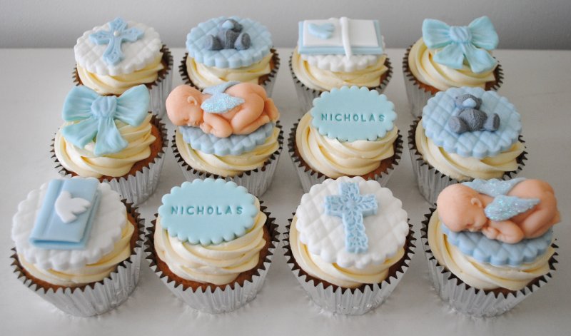 Boy christening cupcakes