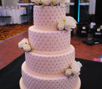 4 tier quilted ivory rose wedding cake