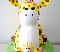 Mummy and baby giraffe birthday novelty cake