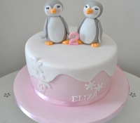 Penguin twin birthday cake