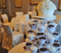 Wedding stand rose swirl cupcakes and giant cupcake cake